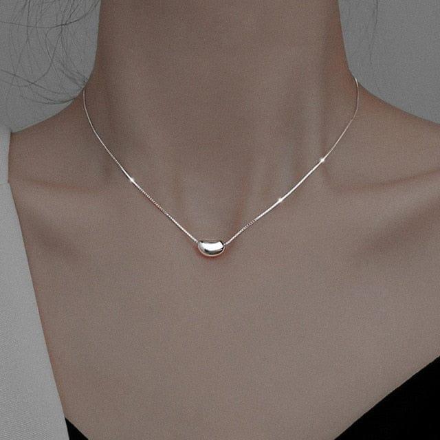 collier HUANZHI 2020 en forme de goutte d’eau pour femmes - Un bijou tendance idéal pour les soirées et les cadeaux - Adenbora