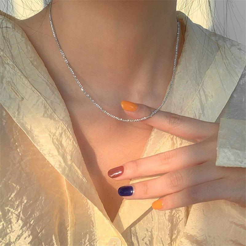 collier HUANZHI 2020 en forme de goutte d’eau pour femmes - Un bijou tendance idéal pour les soirées et les cadeaux - Adenbora